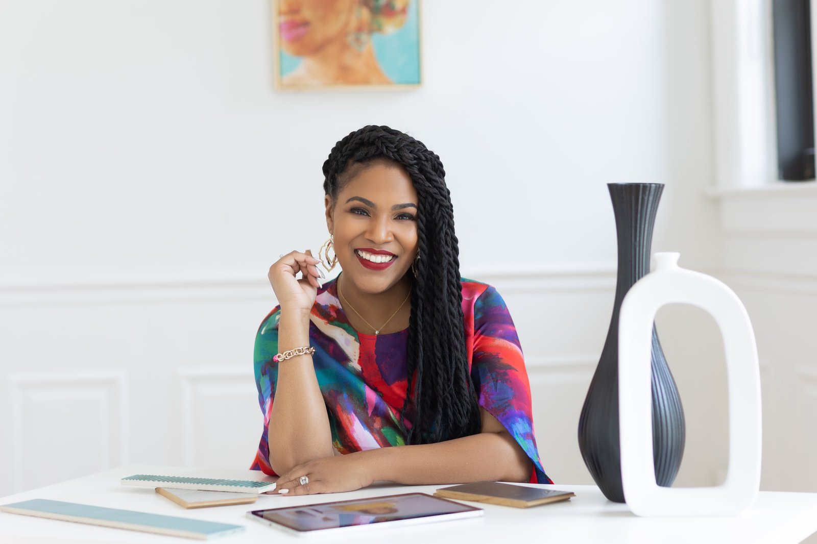 Raquel Ne’Cole at her desk