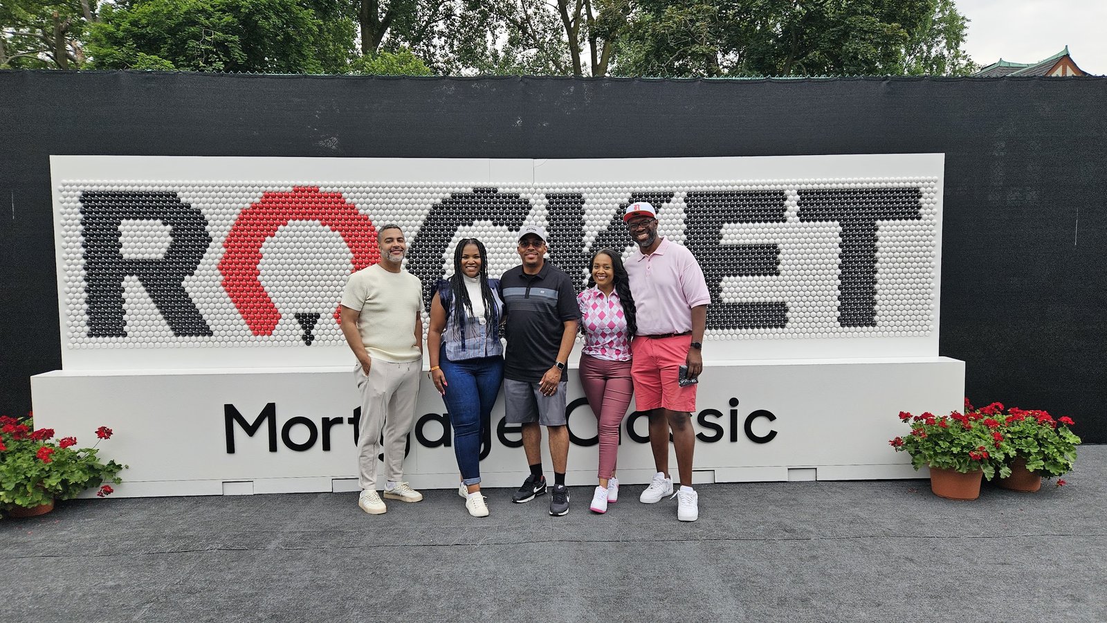 Raquel Ne’Cole with guests at the Rocket Mortgage Classic in Detroit